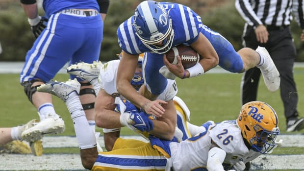 Nov 6, 2021; Durham, North Carolina, USA; Duke Blue Devils quarterback Riley Leonard (10) is tackled on a keeper during the third quarter against the Pittsburgh Panthers at Wallace Wade Stadium. Mandatory Credit: William Howard-USA TODAY Sports